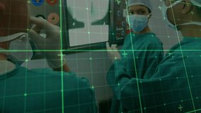 Animation of data processing over diverse surgeons in hospital. Global medicine, healthcare services, computing and data processing concept digitally generated video. - Powered by Shutterstock - Get 15% off with code: PIKWIZARD15