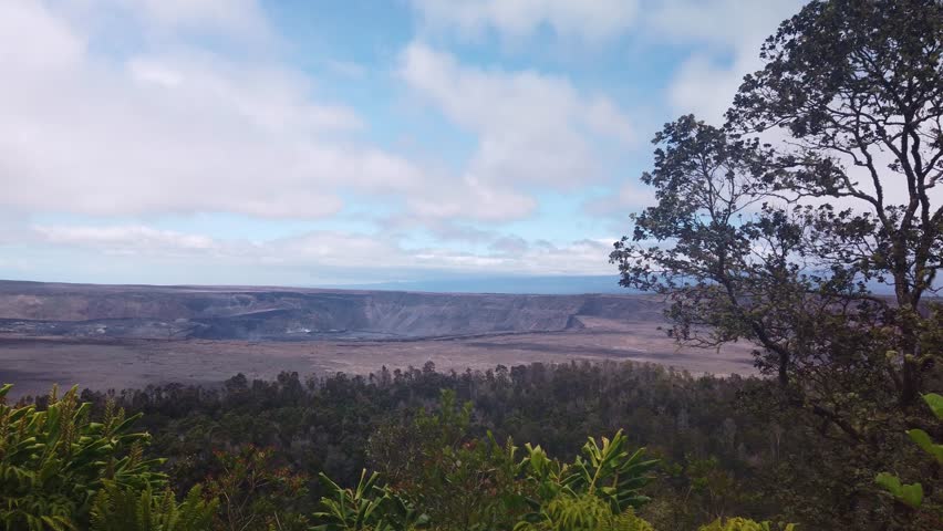 Gimbal dolly shot of the caldera and crater at Kilauea from Volcano House in Hawai