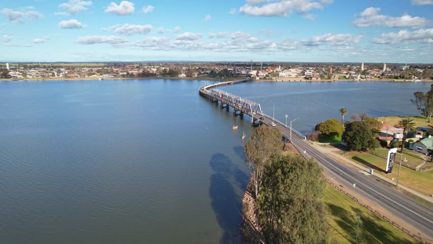 Over trees and the road bridge towards the town of Yarrawonga, Victoria, Australia