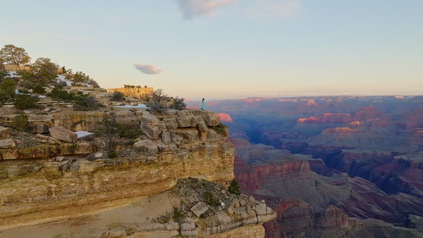 Breathtaking View Of A Person Over The Kaibab Limestone In Grand Canyon National Park In Arizona, USA. Aerial Shot
