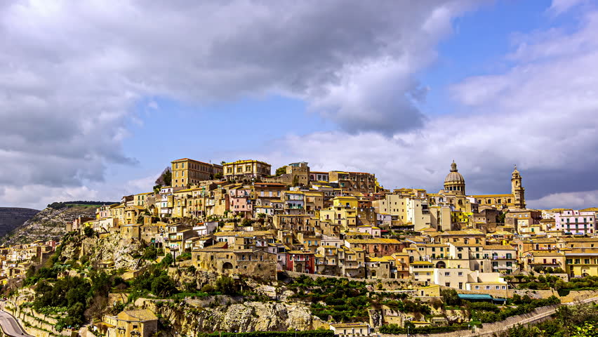 A Still Shot Of A Panoramic View Of An Ancient City Located On A Hill In Italy