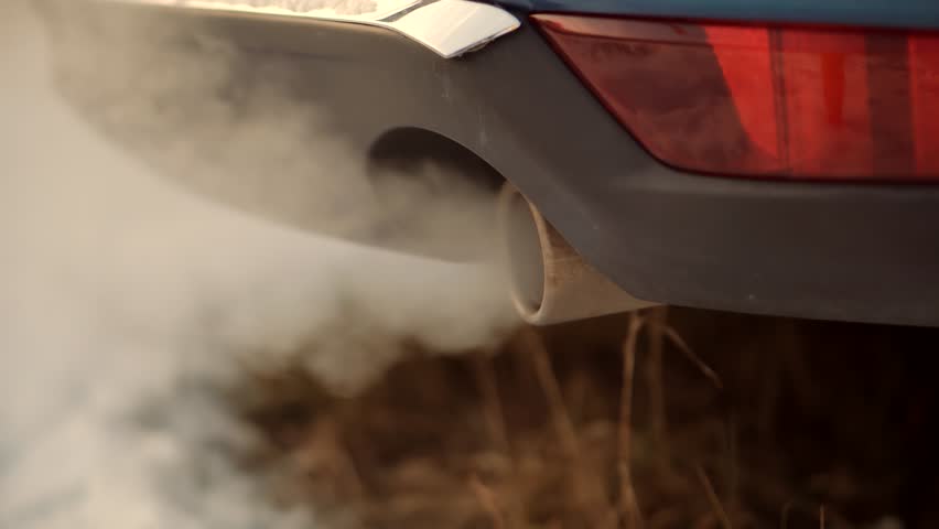 Ecology Problem Driver Co2 Dioxide Emission. Gasoline Or Diesel Car Exhaust Fumes Ecology Pollution. Transport Tailpipe Muffler Smog.Eco Problem Toxic Gas. Air Pollution Smoke Car Exhaust Pipe Muffler