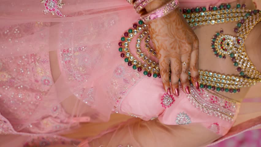 vertical shot of happy Indian bridal showing necklace jewelry - concept of luxury wear, Indian traditional marriage and wedding costume