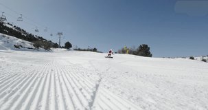 Santa Claus snowboarding down ski slope. A man in Santa Claus suit riding through ski slope. Christmas or New Year festive mood. Winter vacations and outdoor activities - Powered by Shutterstock - Get 15% off with code: PIKWIZARD15