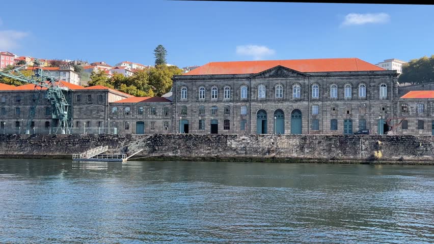 Customs House and Transports, Communications Museum - Porto, Portugal. The Alfandega Nova do Porto (The New Porto Customs House) was built in 1879 to replace medieval warehouses. Royalty-Free Stock Footage #1111139103
