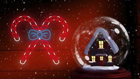 Animation of candy canes neon over christmas snow globe with house on red background. Christmas, tradition, celebration movement and colour concept digitally generated video. - Powered by Shutterstock - Get 15% off with code: PIKWIZARD15