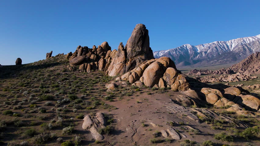 Cinematic aerial shot of rocky landscape in Alabama Hills in California, USA