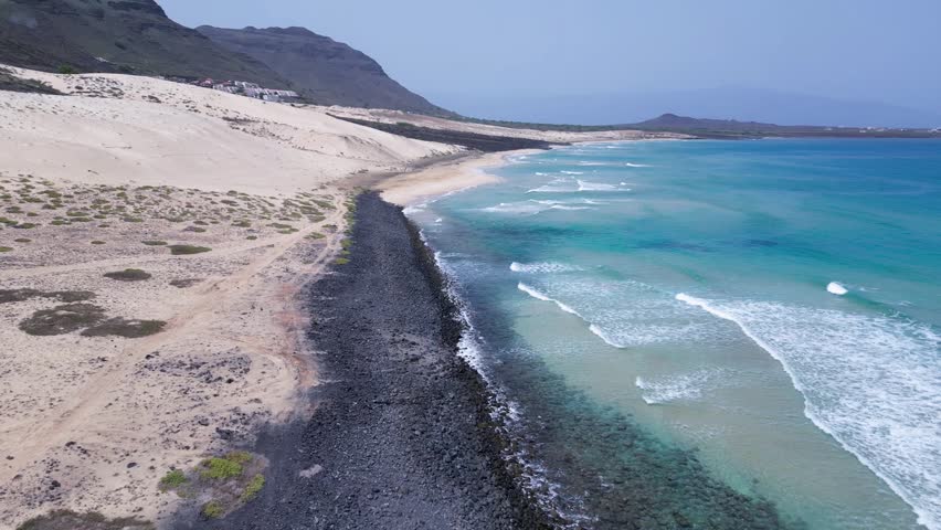Drone video over surf and dunes in Wydmy National Park, Cape Verde
