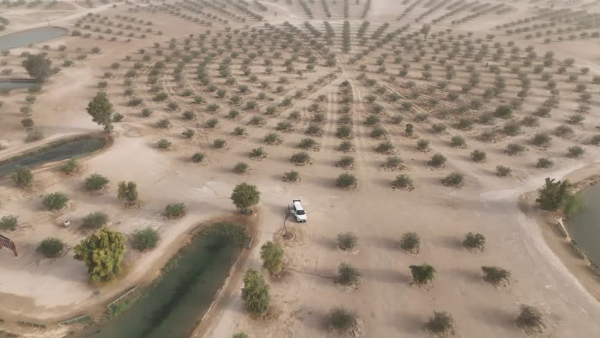 Aerial view of Al Kudra desert and lakes, Dubai Royalty-Free Stock Footage #1111149331