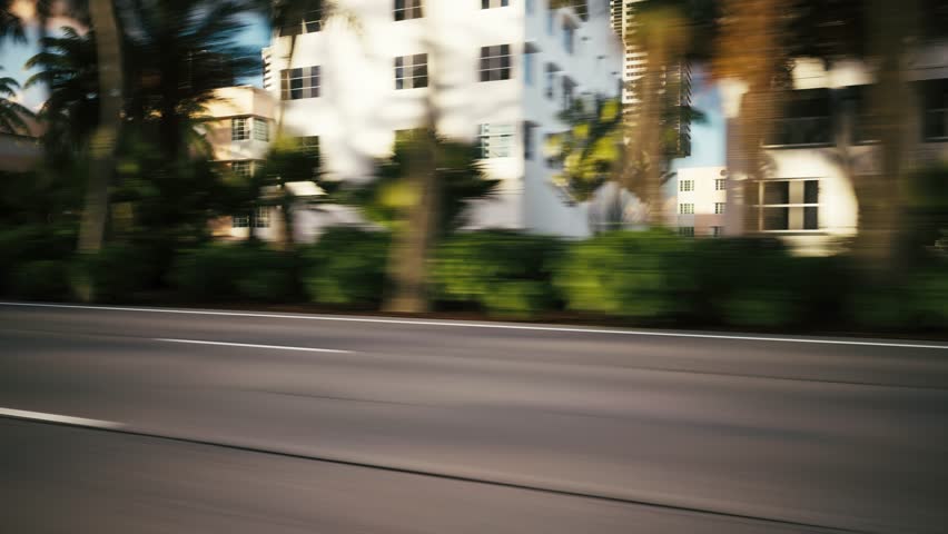 Luxury car drives at high speed. Sports car is driving the road at high speed. Car driving high speed on Miami