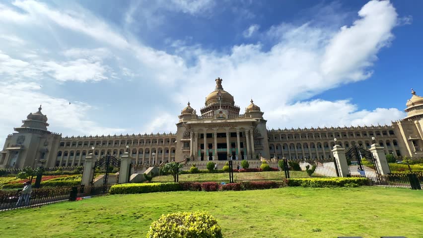 Vidhana Soudha, Bangalore's architectural masterpiece, captured in stunning detail. The seat of Karnataka's government stands tall, exuding grandeur against the cityscape. A visual testament to the bl Royalty-Free Stock Footage #1111152249