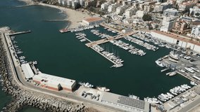 Picturesque drone video of aerial footage of Marina Marbella, situated on the Costa del Sol, in the town of Marbella, south Spain