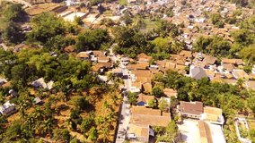 Drone Videography. Aerial Footage. Landscape view of public housing on the edge of Bandung city, filled with densely populated residential areas. Shot in 4k resolution from a flying drone. Asia
