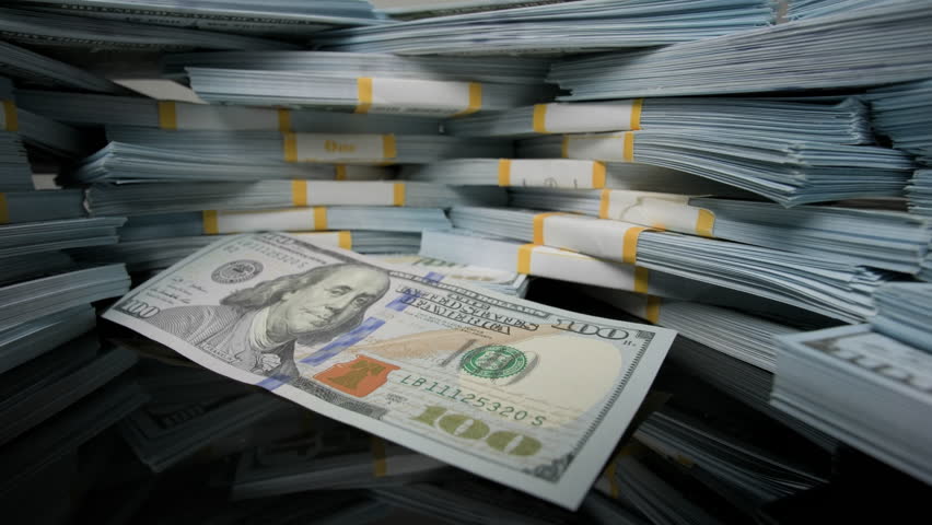 Stacks of money dollar bills close-up.