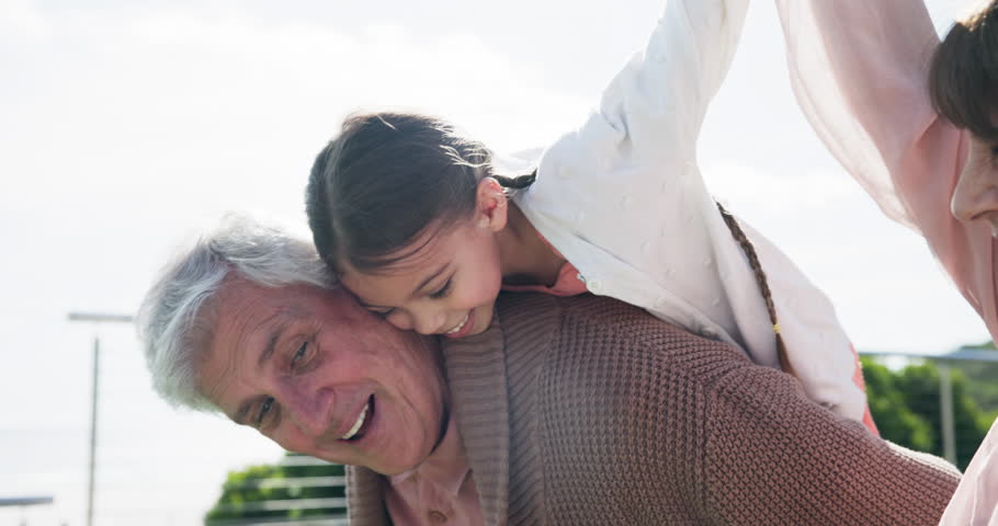 Grandparents, airplane and kid holding hands outdoor, bonding and freedom together. Senior woman, man piggyback child and happy girl play flying game with grandmother, grandfather or portrait of love Royalty-Free Stock Footage #1111182191