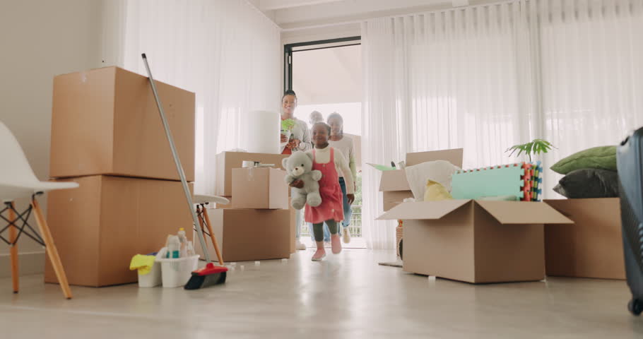 New home, black family and high five, play in box and happy in living room of property. Real estate, African mother and children with father celebrate success, moving or smile in house for relocation | Shutterstock HD Video #1111182775
