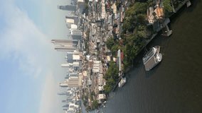 Vertical video. Aerial view of Bangkok city skyline.