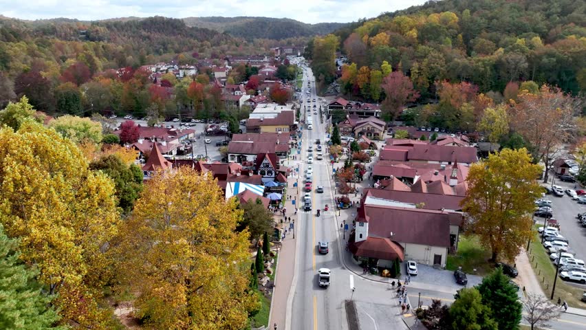 aerial over colorful fall leaves over helen georgia