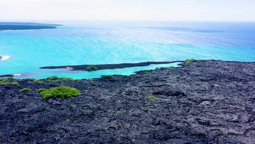 Aerial drone view of Kiholo Bay and Wainanalii Pond, Hawaii Island, Hawaii, United States.