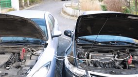 Charging the car battery with electricity jumper cables