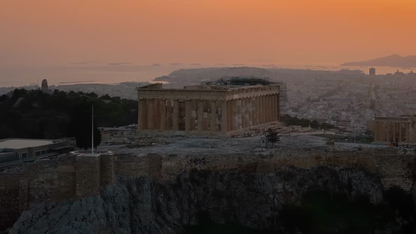 Close-up view of the ancient Parthenon Temple at the Acropolis of Athens, Greece, during golden sunset time Royalty-Free Stock Footage #1111213699