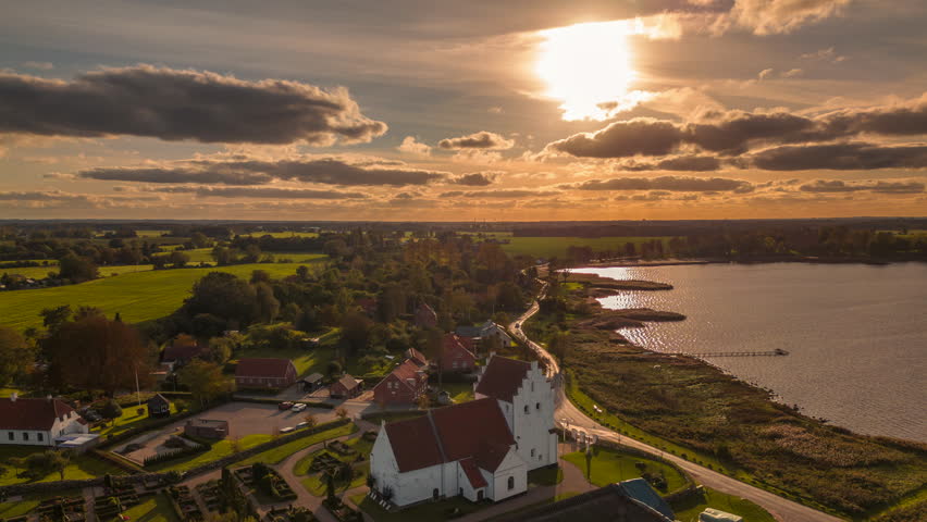 Hyperlapse of seaside church at sunset 