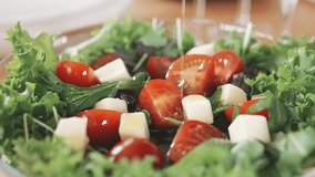 Drizzling Olive Oil on Italian Salad - Powered by Shutterstock - Get 15% off with code: PIKWIZARD15