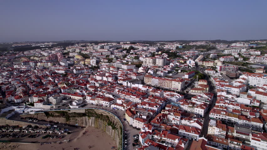 Ericeira is a civil parish and seaside community on the western coast of Portugal (in Mafra municipality, located 35km northwest of the center of Lisbon. Royalty-Free Stock Footage #1111231647