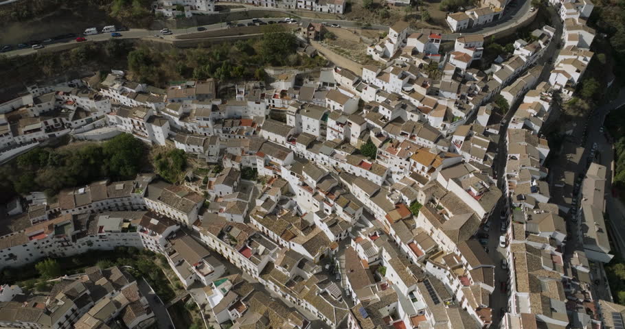 Setenil de las Bodegas is a town in southern Spain. It’s known for its whitewashed houses built into the surrounding cliffs. Royalty-Free Stock Footage #1111231763