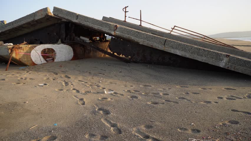 Consequences after the hurricane.
  Consequences of a crash after a hurricane. The sea wave washed away the bridge, causing a giant deadly tsunami to damage the bridge and road.