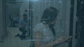 Animation of data processing against diverse male and female engineer working at server room. Cyber security and business data storage technology concept - Powered by Shutterstock - Get 15% off with code: PIKWIZARD15