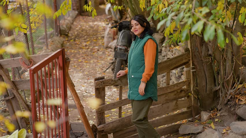 The Charming Girl in the Sunny Autumn Park