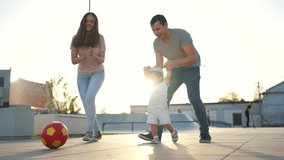 mother and father teaches son baby to ride skateboard. happy family kid dream concept. child baby rides skateboard dad helps. mother day concept lifestyle. child playing riding skateboard outdoors - Powered by Shutterstock - Get 15% off with code: PIKWIZARD15