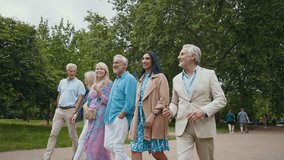 Group of old friends spending time together in the main parts of london, visiting the westminster area and st. james park. Old buddies reunion. Concept about third age and seniority - Powered by Shutterstock - Get 15% off with code: PIKWIZARD15