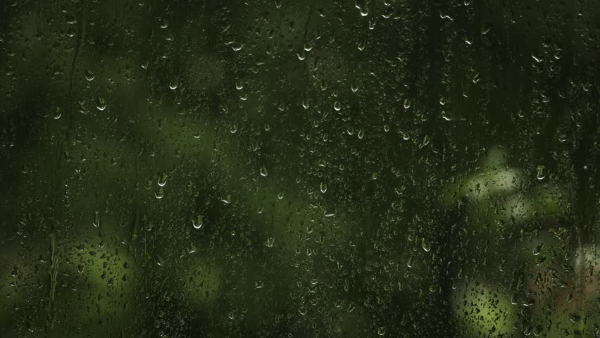 Rain drops on window on the rainy day. Home comfort and tranquility | Shutterstock HD Video #1111311227