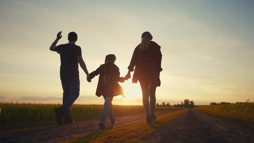 happy family in park at sunset. people group father and daughters walking in nature at sunset in the park. friendly lifestyle family kid dream concept. fathers day concept Royalty-Free Stock Footage #1111314871