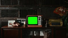 Green Screen Old Television Zoom In Retro TV Vintage House. Old retro television with green screen, for replacement, inside a vintage house. Zoom in - Powered by Shutterstock - Get 15% off with code: PIKWIZARD15
