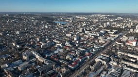 Chisinau from above, shot on flying drone, aerial view of the winter central city. 