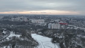 Chisinau from above, shot on flying drone, aerial view of the winter central city park.