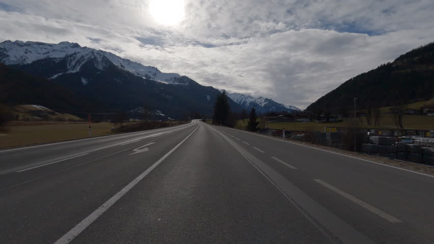 POV FRONT VIEW DRIVING PLATE car driving on winter roads in Austrian Alps | Shutterstock HD Video #1111372287