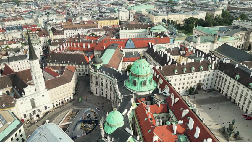 Aerial view of Vienna, iconic European capital. Flying over Danube River, showcasing historic downtown, old buildings in HD and 4K resolution. Wien, Vienna, Austria. Travel concept