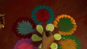 preparation  video clip of rangoli on the eve of diwali in India 