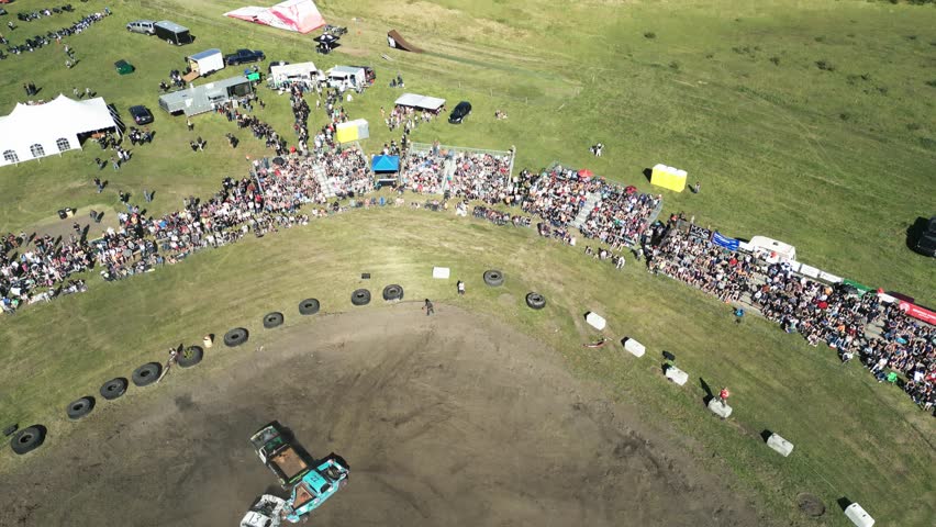 Drone angle of cars crashing into each other at Demolition Derby