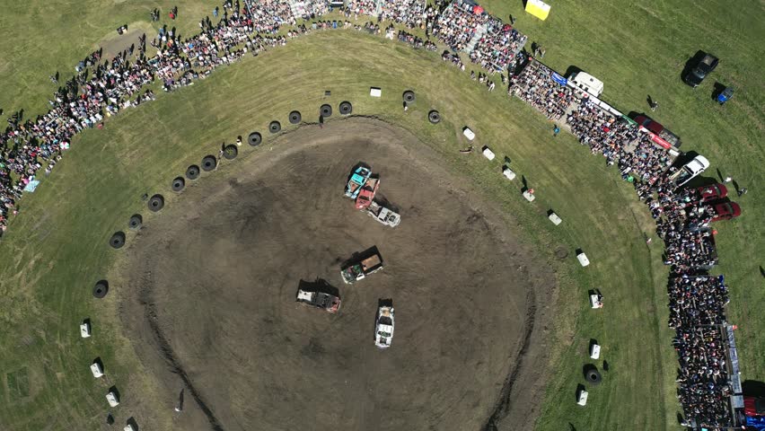 Drone angle of cars crashing into each other at Demolition Derby