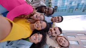 POV video of young adult diverse friends smile at phone camera on selfie group portrait. Teenage community concept with joyful millennial students having fun together having video call with phone. - Powered by Shutterstock - Get 15% off with code: PIKWIZARD15