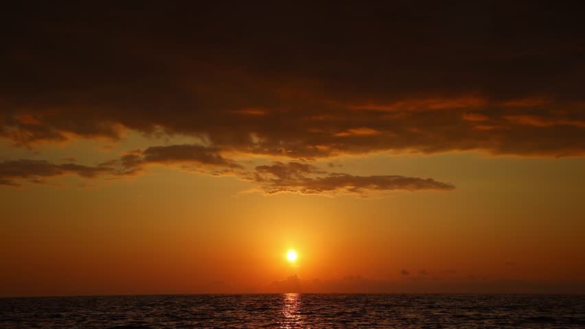 Magnificent dramatic sunset over the sea. Peace and tranquility | Shutterstock HD Video #1111413045