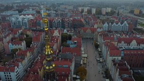Aerial cinematic 4K drone video of Gdansk Town Hall Clock Tower up close - Gdansk, Poland
