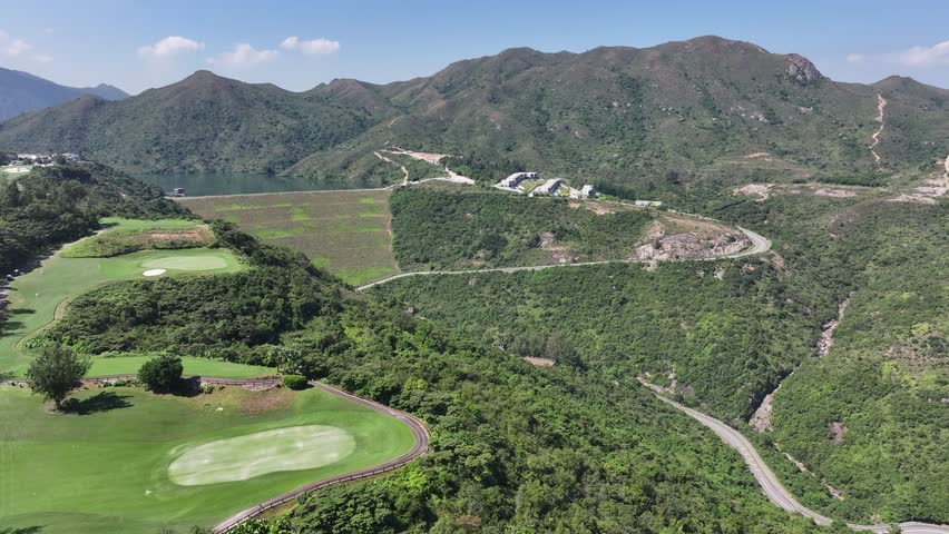 Aerial skyview of coastal golf clubhouse among seaside hill in Discovery Bay Villa Premium apartment house villages beach resort Yacht Club in Lantau Island Hong Kong