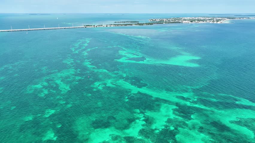 Aerial shot of the Florida Keys and the highway the connects them. Royalty-Free Stock Footage #1111428021