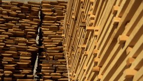 Wooden boards in a sawmill close up. Edged board. Lumber. 4k footage.